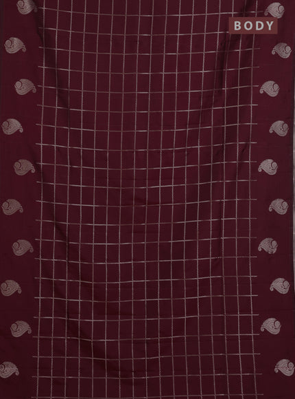 Semi soft silk saree maroon with allover zari woven checked pattern and paisley zari woven butta border