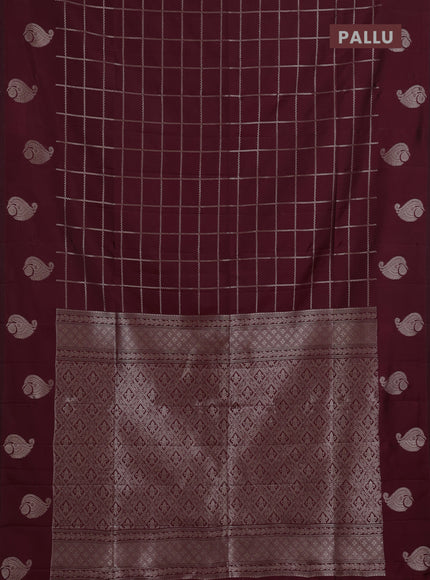Semi soft silk saree maroon with allover zari woven checked pattern and paisley zari woven butta border