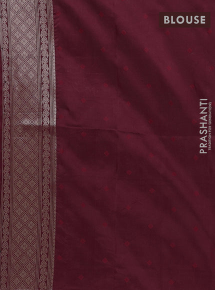 Semi soft silk saree maroon with allover zari woven checked pattern and paisley zari woven butta border