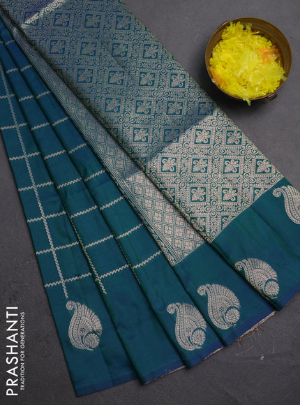 Semi soft silk saree peacock green with allover zari woven checked pattern and paisley zari woven butta border