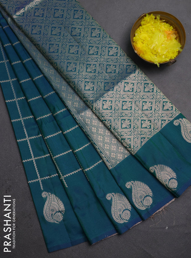 Semi soft silk saree peacock green with allover zari woven checked pattern and paisley zari woven butta border