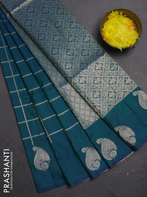 Semi soft silk saree peacock green with allover zari woven checked pattern and paisley zari woven butta border