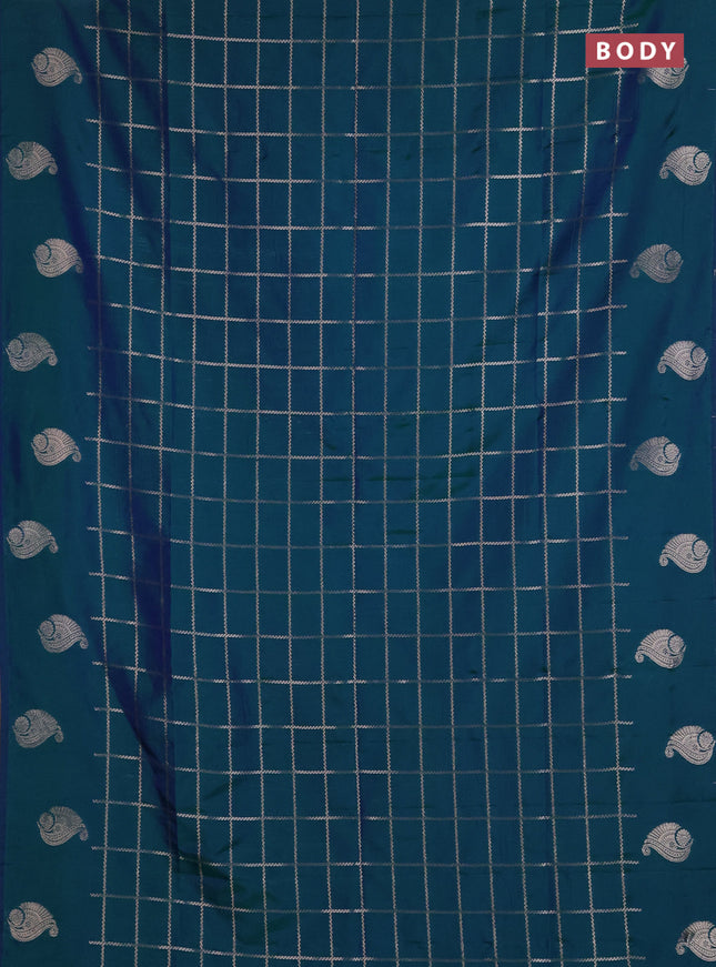 Semi soft silk saree peacock green with allover zari woven checked pattern and paisley zari woven butta border