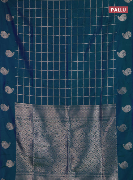 Semi soft silk saree peacock green with allover zari woven checked pattern and paisley zari woven butta border