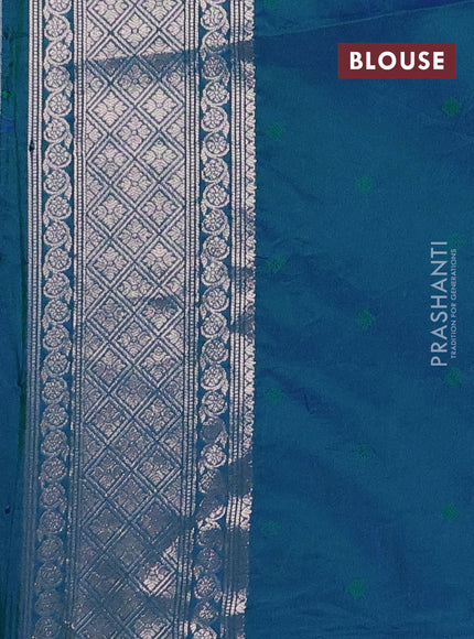 Semi soft silk saree peacock green with allover zari woven checked pattern and paisley zari woven butta border