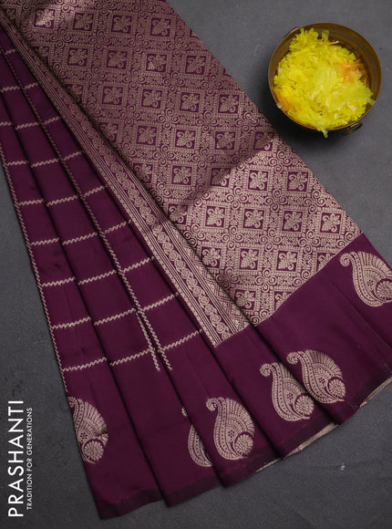 Semi soft silk saree deep purple with allover zari woven checked pattern and paisley zari woven butta border