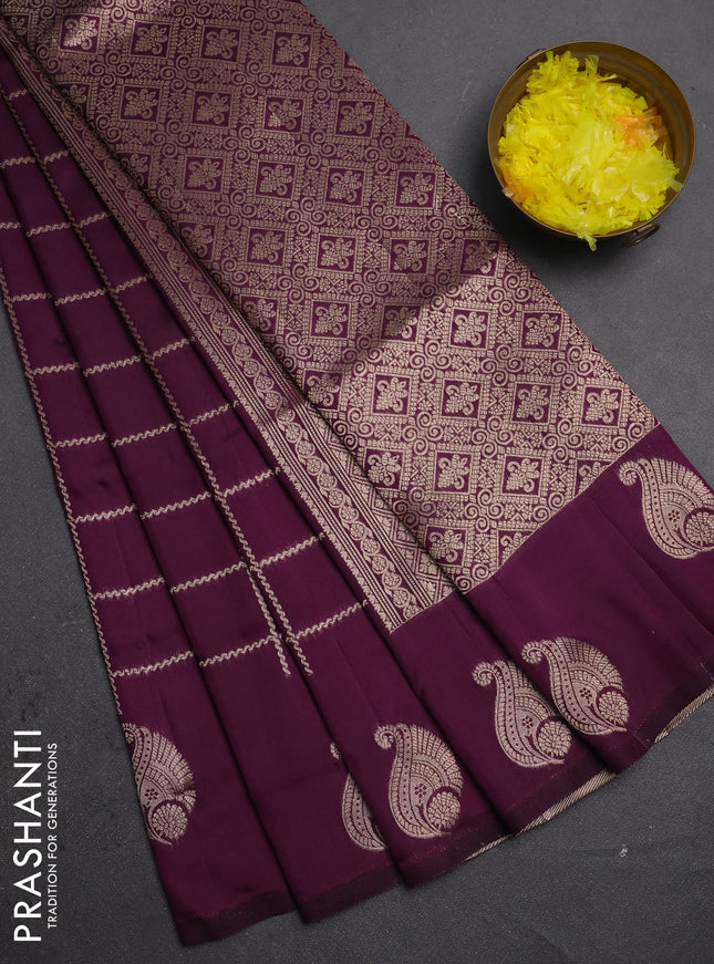 Semi soft silk saree deep purple with allover zari woven checked pattern and paisley zari woven butta border