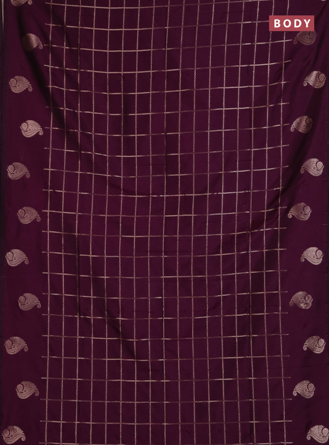 Semi soft silk saree deep purple with allover zari woven checked pattern and paisley zari woven butta border