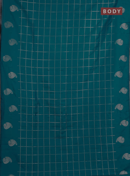 Semi soft silk saree teal blue with allover zari woven checked pattern and paisley zari woven butta border