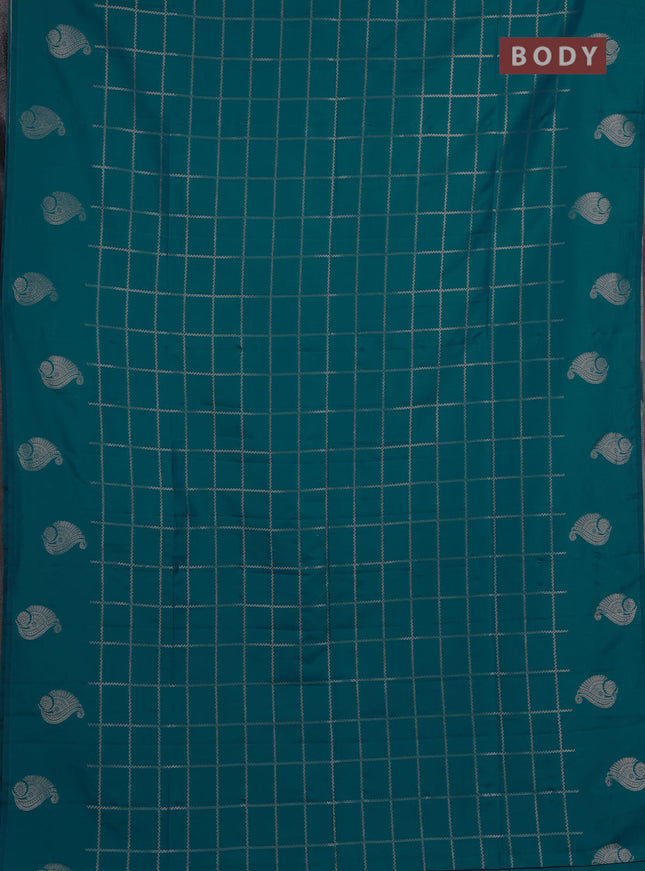 Semi soft silk saree teal blue with allover zari woven checked pattern and paisley zari woven butta border