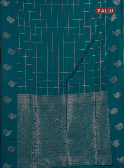 Semi soft silk saree teal blue with allover zari woven checked pattern and paisley zari woven butta border