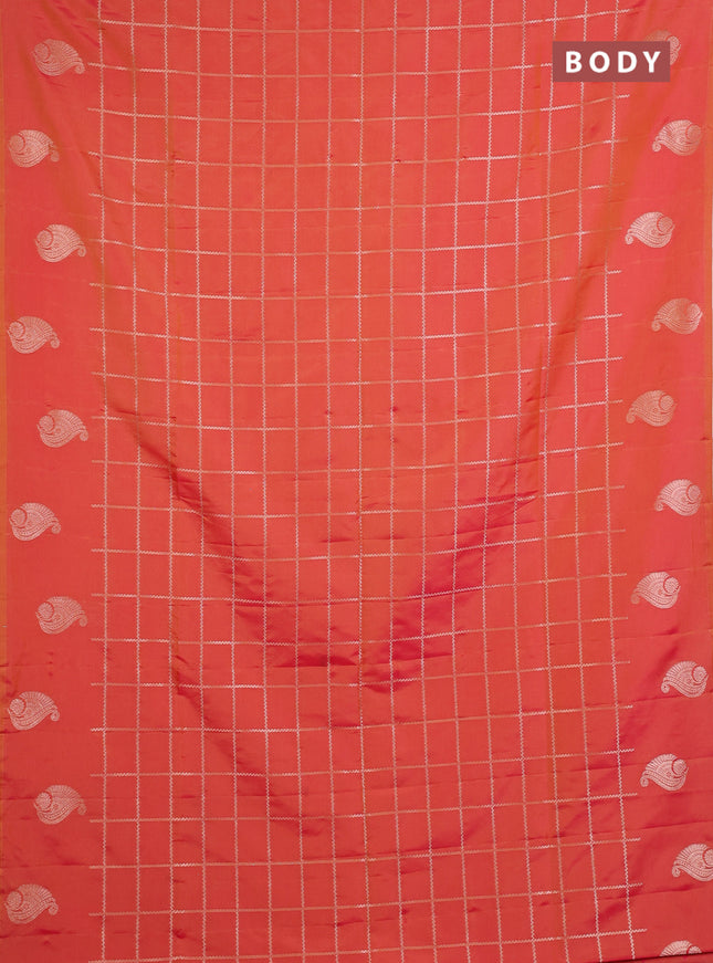 Semi soft silk saree sunset orange with allover zari woven checked pattern and paisley zari woven butta border