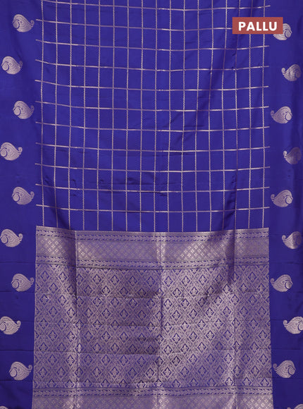 Semi soft silk saree navy blue with allover zari woven checked pattern and paisley zari woven butta border