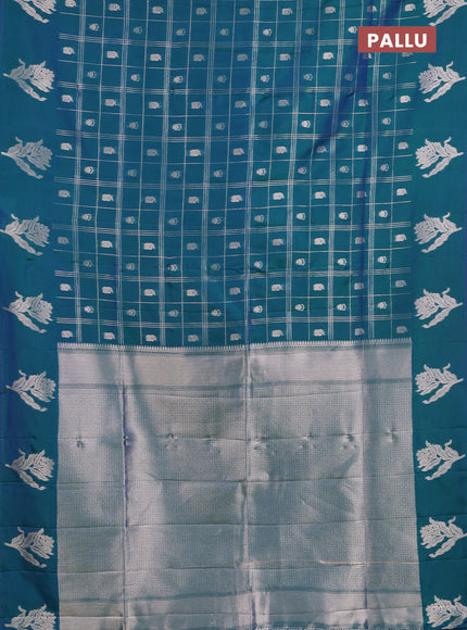 Semi soft silk saree peacock green with allover zari checks & buttas and zari woven butta border
