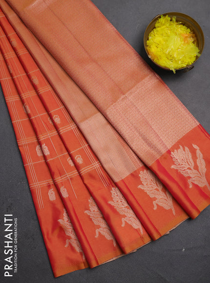 Semi soft silk saree sunset orange with allover zari checks & buttas and zari woven butta border