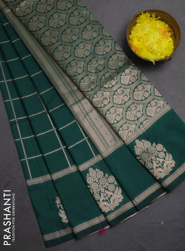 Semi soft silk saree bottle green with allover zari woven checked pattern and zari woven butta border