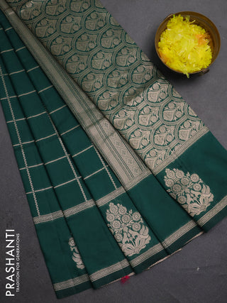 Semi soft silk saree bottle green with allover zari woven checked pattern and zari woven butta border
