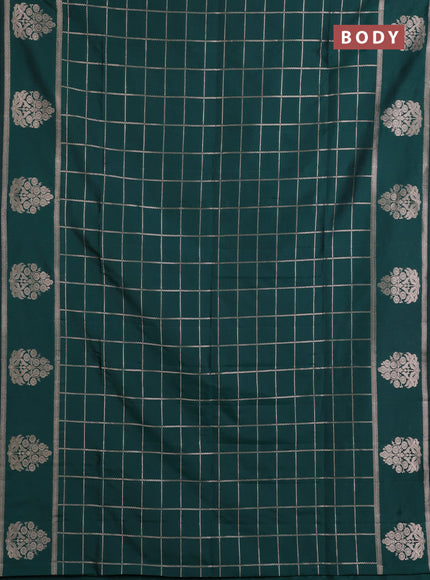 Semi soft silk saree bottle green with allover zari woven checked pattern and zari woven butta border