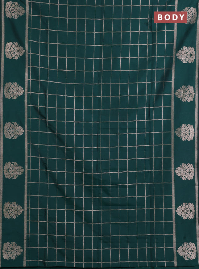 Semi soft silk saree bottle green with allover zari woven checked pattern and zari woven butta border