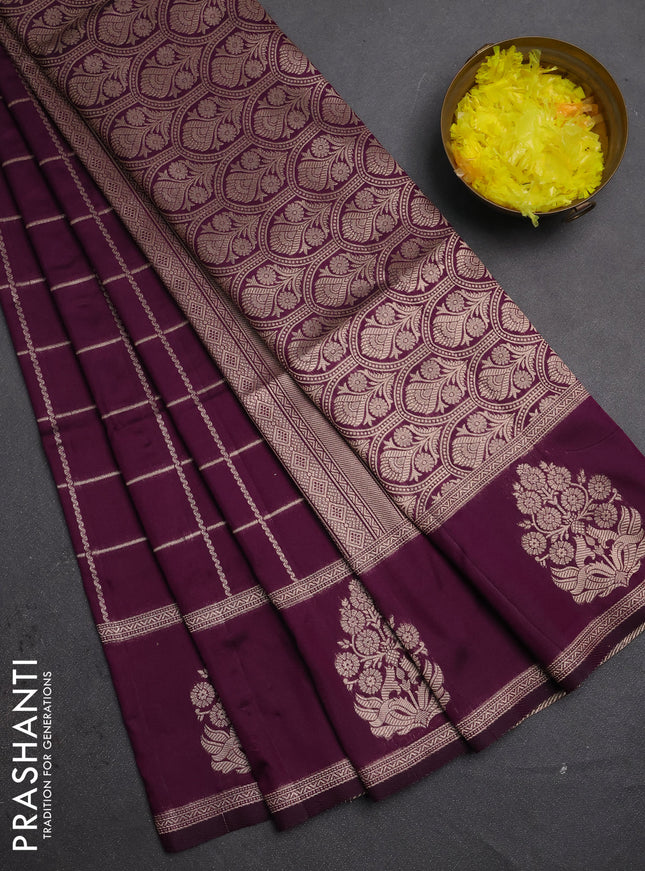 Semi soft silk saree deep purple with allover zari woven checked pattern and zari woven butta border