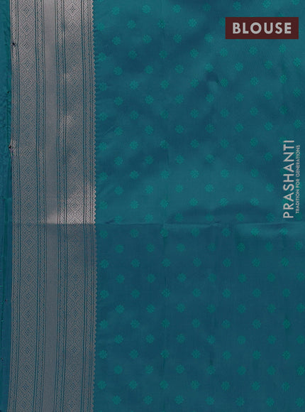 Semi soft silk saree peacock green with allover zari woven checked pattern and zari woven butta border