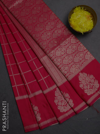 Semi soft silk saree tomato pink with allover zari woven checked pattern and zari woven butta border