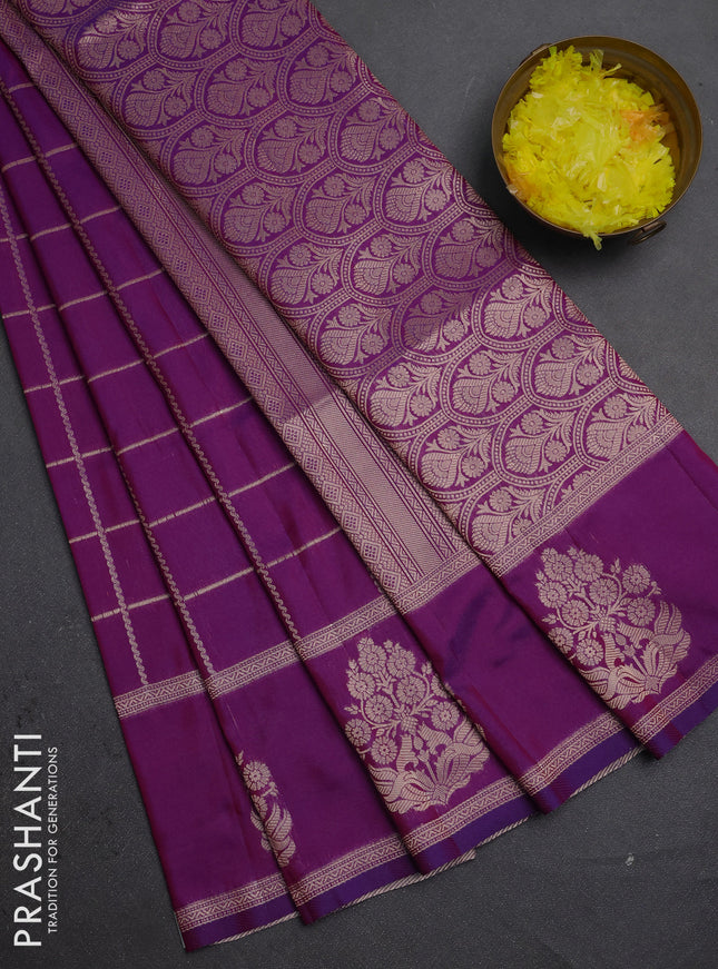 Semi soft silk saree purple with allover zari woven checked pattern and zari woven butta border