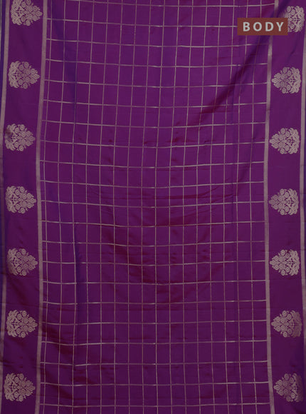 Semi soft silk saree purple with allover zari woven checked pattern and zari woven butta border