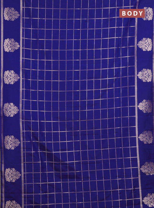 Semi soft silk saree navy blue with allover zari woven checked pattern and zari woven butta border