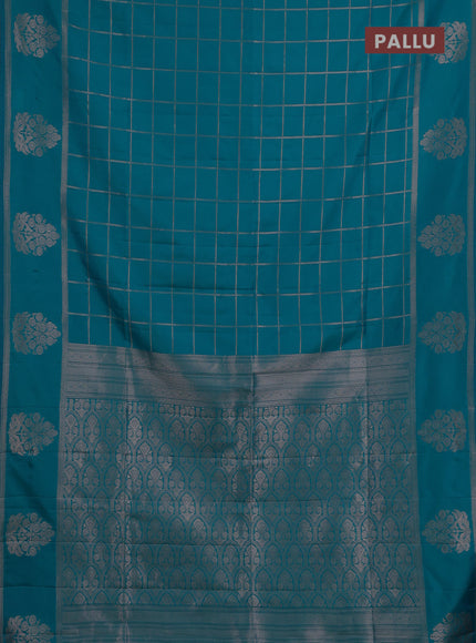 Semi soft silk saree teal blue with allover zari woven checked pattern and zari woven butta border