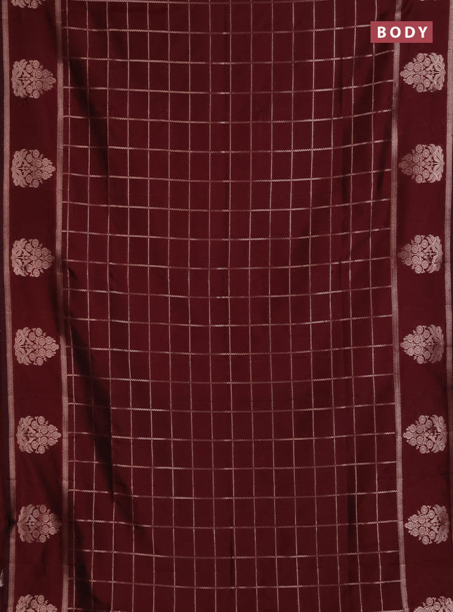 Semi soft silk saree maroon with allover zari woven checked pattern and zari woven butta border