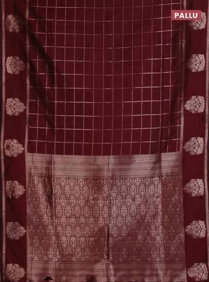 Semi soft silk saree maroon with allover zari woven checked pattern and zari woven butta border