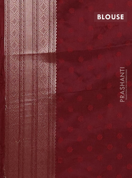 Semi soft silk saree maroon with allover zari woven checked pattern and zari woven butta border