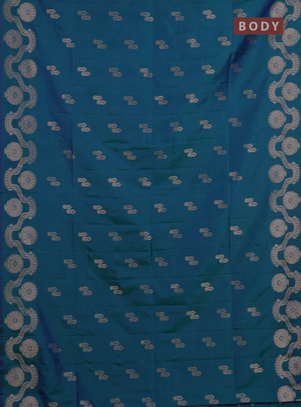 Semi soft silk saree teal green with allover zari woven buttas and zari woven butta border