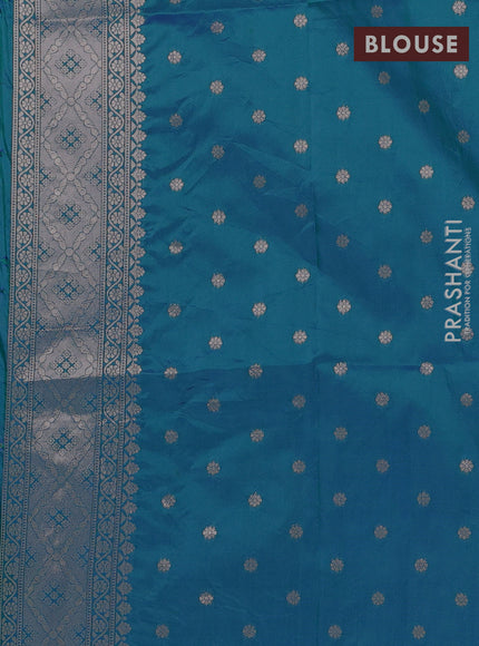 Semi soft silk saree teal green with allover zari woven buttas and zari woven butta border