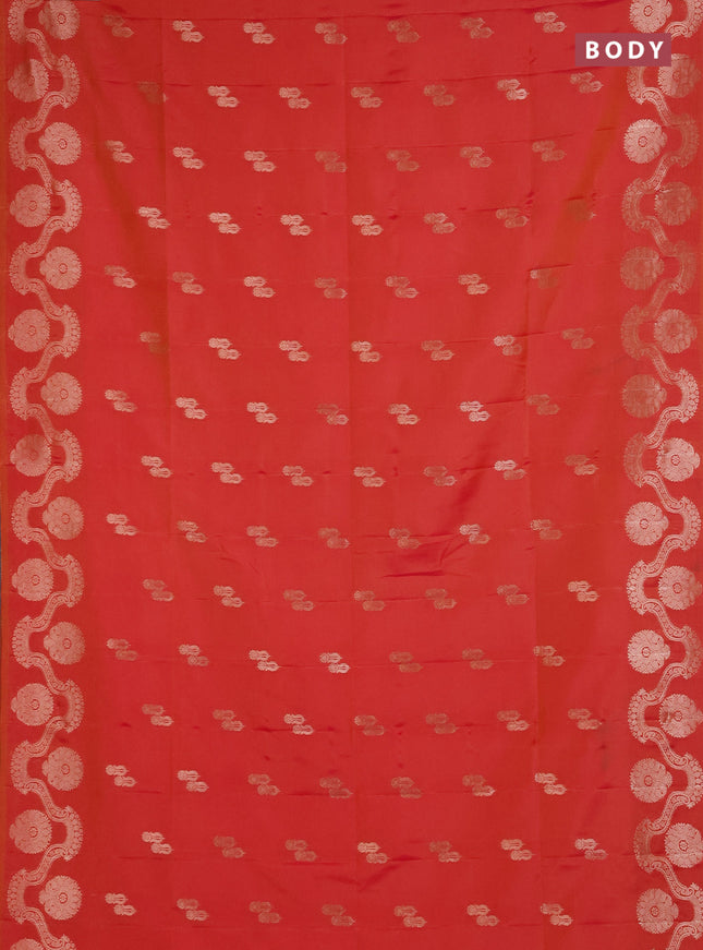 Semi soft silk saree sunset orange with allover zari woven buttas and zari woven butta border