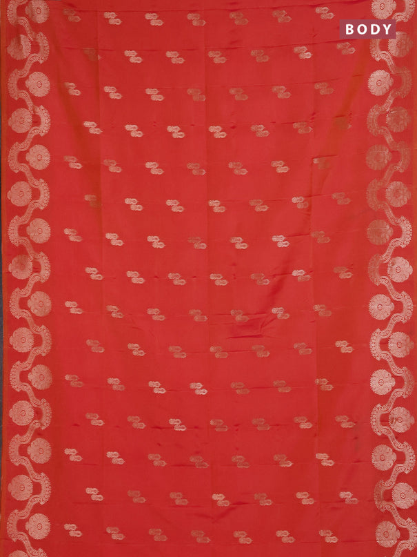 Semi soft silk saree sunset orange with allover zari woven buttas and zari woven butta border