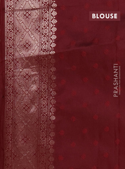 Semi soft silk saree maroon with allover zari woven buttas and zari woven butta border