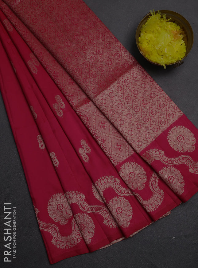 Semi soft silk saree tomato pink with allover zari woven buttas and zari woven butta border