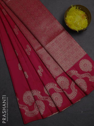 Semi soft silk saree tomato pink with allover zari woven buttas and zari woven butta border