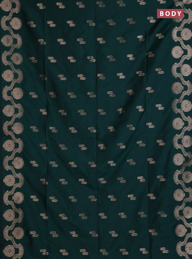 Semi soft silk saree bottle green with allover zari woven buttas and zari woven butta border
