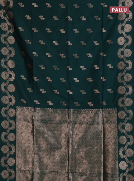 Semi soft silk saree bottle green with allover zari woven buttas and zari woven butta border