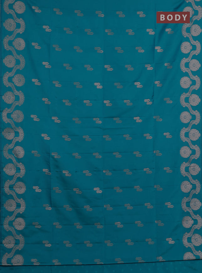 Semi soft silk saree teal blue with allover zari woven buttas and zari woven butta border