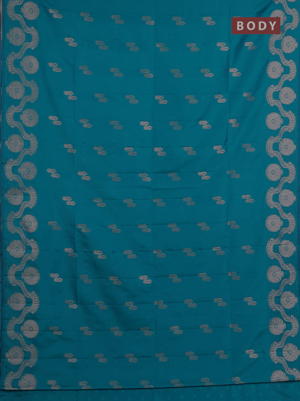 Semi soft silk saree teal blue with allover zari woven buttas and zari woven butta border