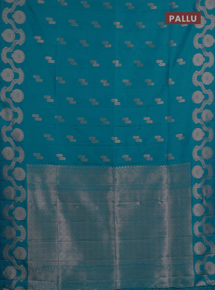 Semi soft silk saree teal blue with allover zari woven buttas and zari woven butta border