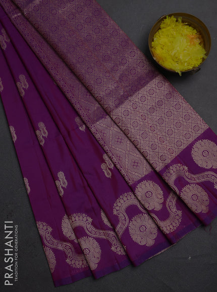 Semi soft silk saree purple with allover zari woven buttas and zari woven butta border