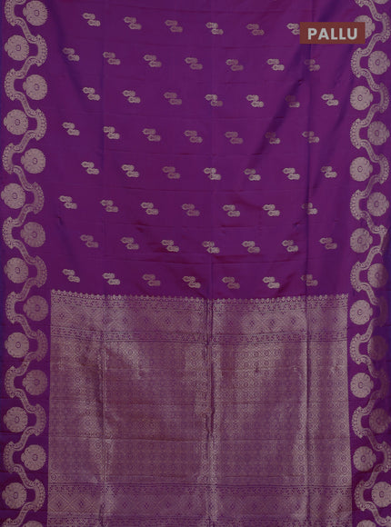 Semi soft silk saree purple with allover zari woven buttas and zari woven butta border