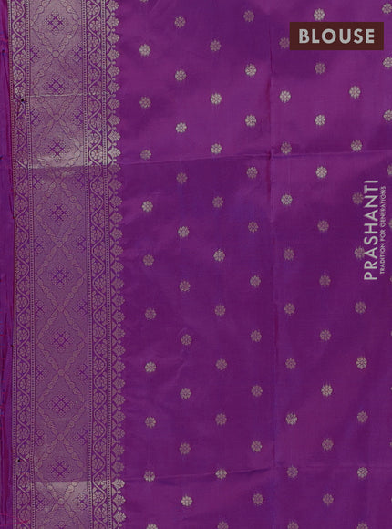 Semi soft silk saree purple with allover zari woven buttas and zari woven butta border