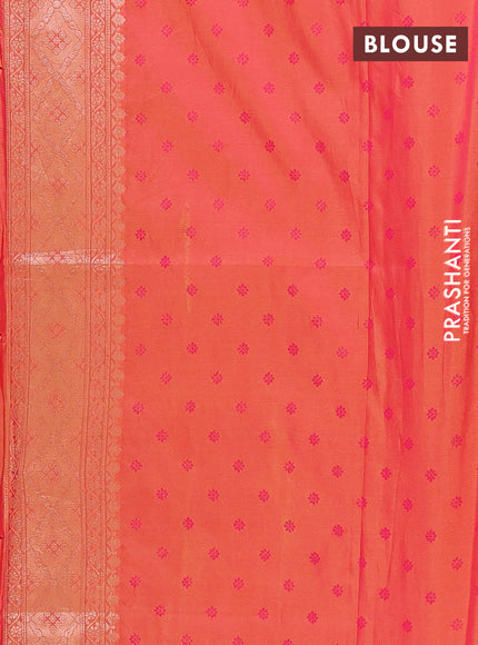 Semi soft silk saree sunset orange with allover zari woven buttas and zari woven butta border