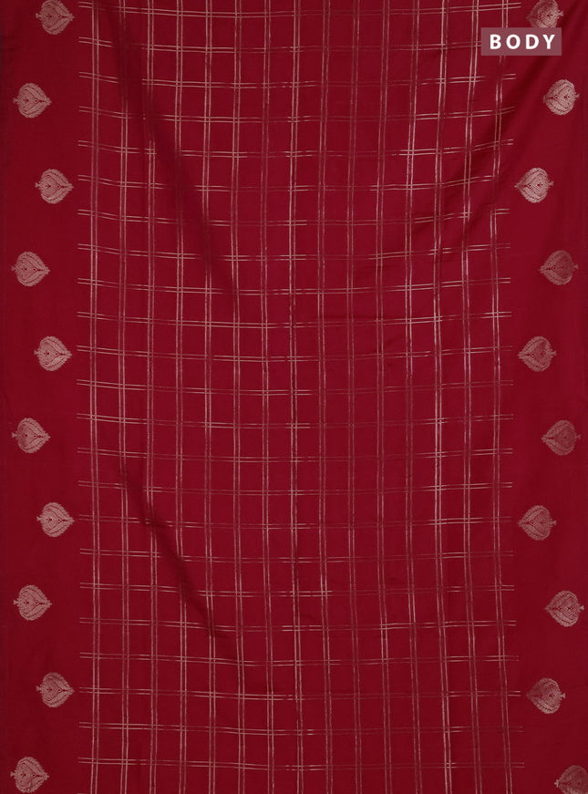 Semi soft silk saree tomato pink with allover zari woven checked pattern and zari woven butta border
